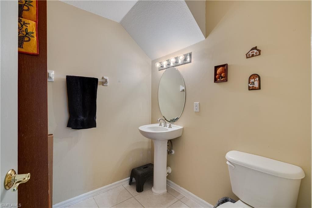 Half Bathroom Located Downstairs