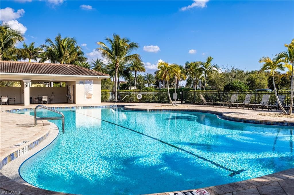 Community pool featuring a patio area