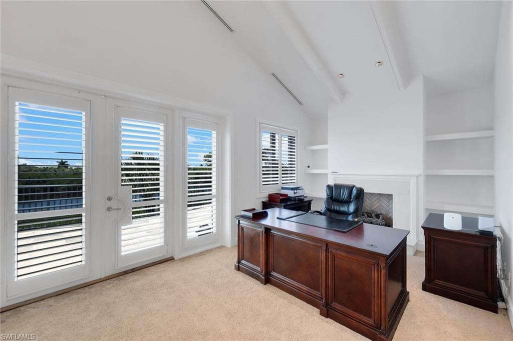 Living/Den Area w/ stunning water & sunset views - possible 4th/5th bedroom.