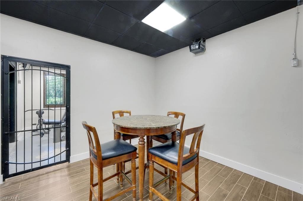 Sitting area in Speakeasy/Entertaining Room with private wine room