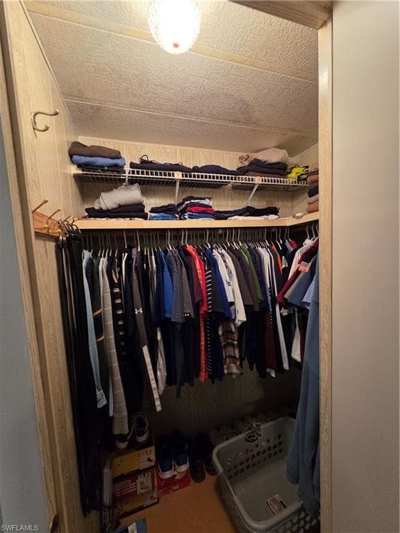 One of two walk-in closets in the Primary bedroom