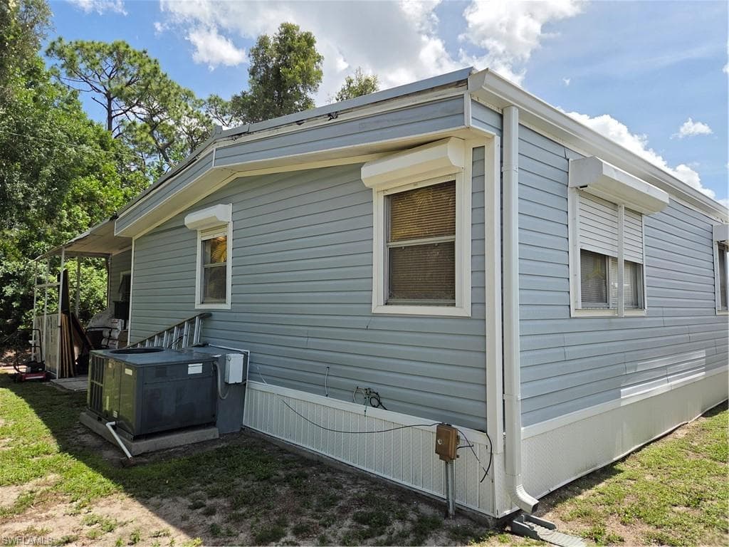 Electric storm shutters in front & back; manual shutters on sides.
