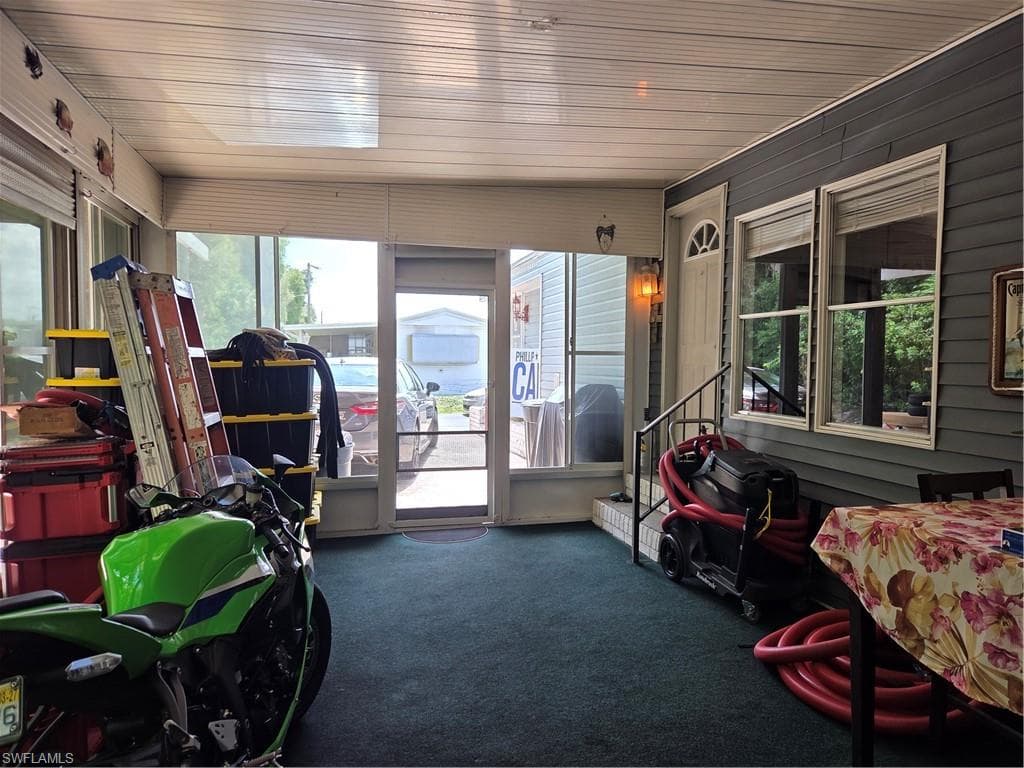 Screened breezeway for extra room to entertain or relax.