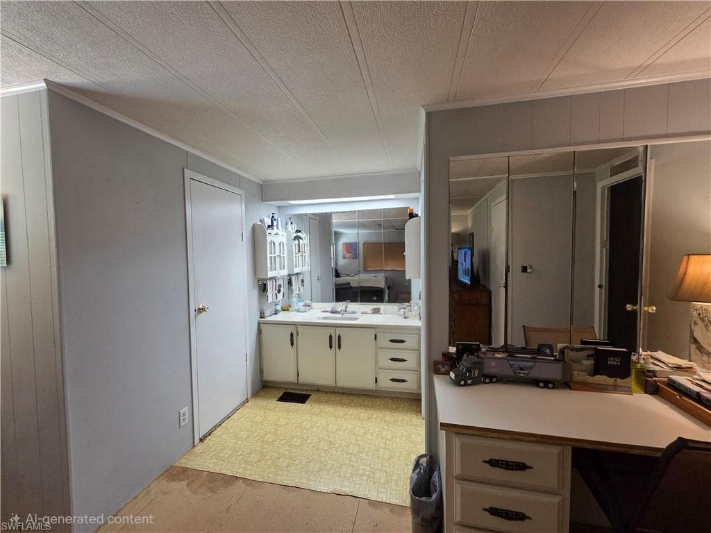 Additional work area in the Primary bedroom. Primary bathroom has a walk-in closet.