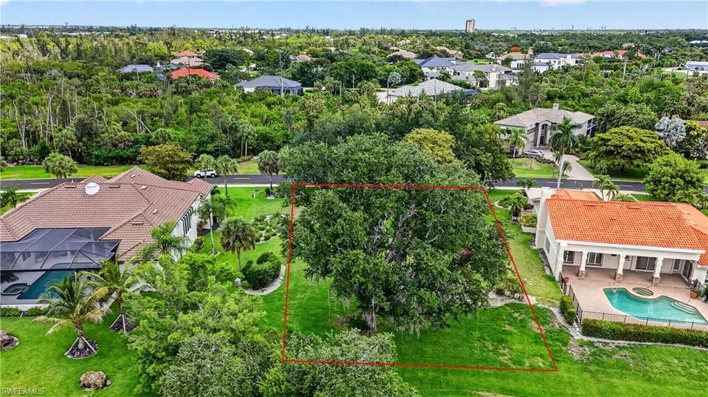 16047 Forest Oaks DR photo 2 of 36