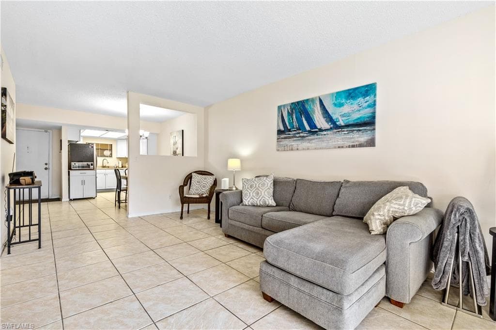 Reverse view of living room to unit entry