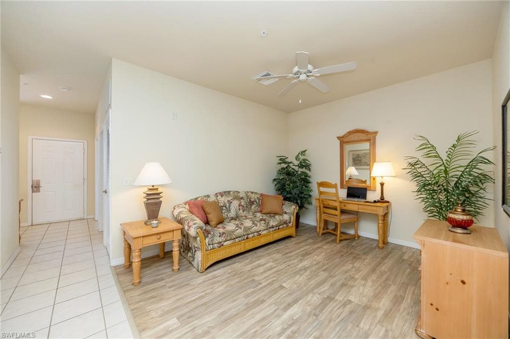 The versatile den can easily serve as a home office, media room, or additional guest accommodations.