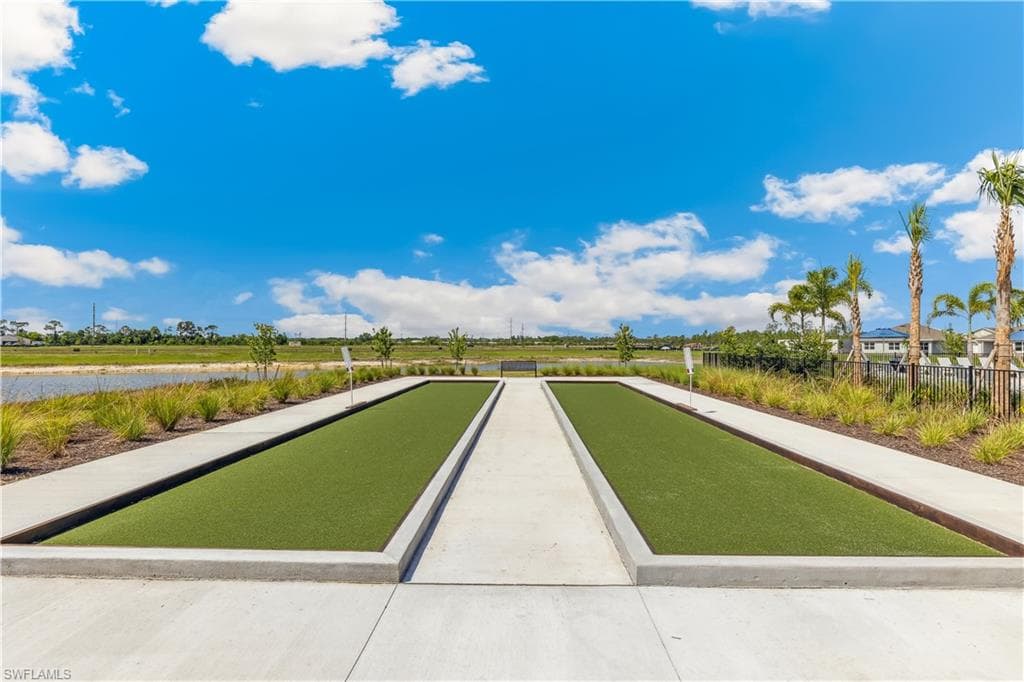 The property offers recreational amenities, including bocce ball courts with artificial turf playing surfaces and concrete borders