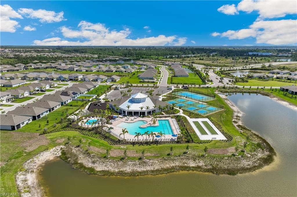 This community features a central clubhouse with a pool, multiple sport courts, and green spaces