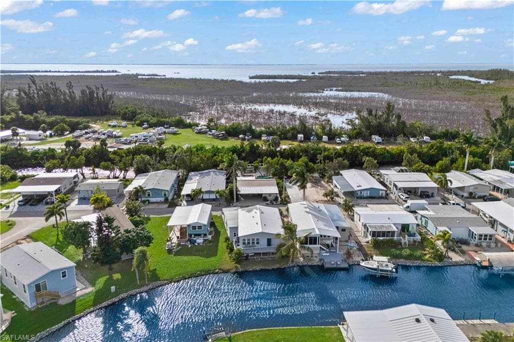 Whether you're searching for a year-round residence, winter retreat, or affordable waterfront getaway, this exceptional property offers the perfect blend of WATERFRONT LIVING, BOATING ACCESS, LOW-MAINTENANCE OWNERSHIP, and the laid-back island lifestyle that makes Pine Island one of Southwest Florida's hidden gems