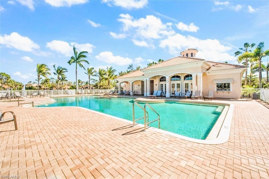 View of swimming pool with a patio area