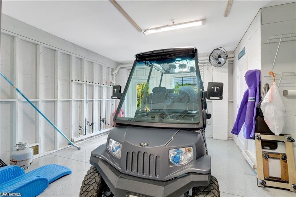 Garage (has rear exit/access leading to pool/dock area)