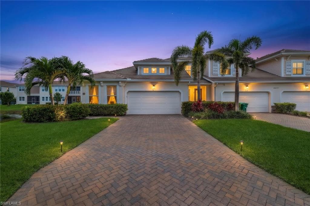 Single story attached villa with exceptional location.