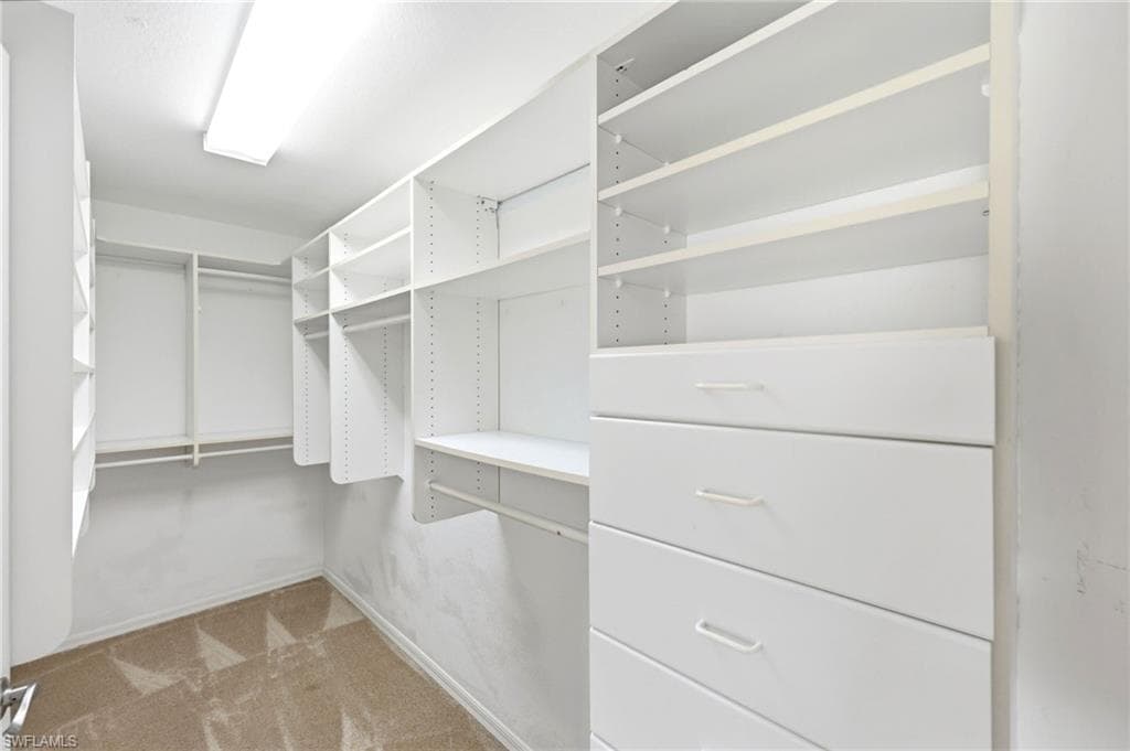Primary bedroom walk-in California Closet