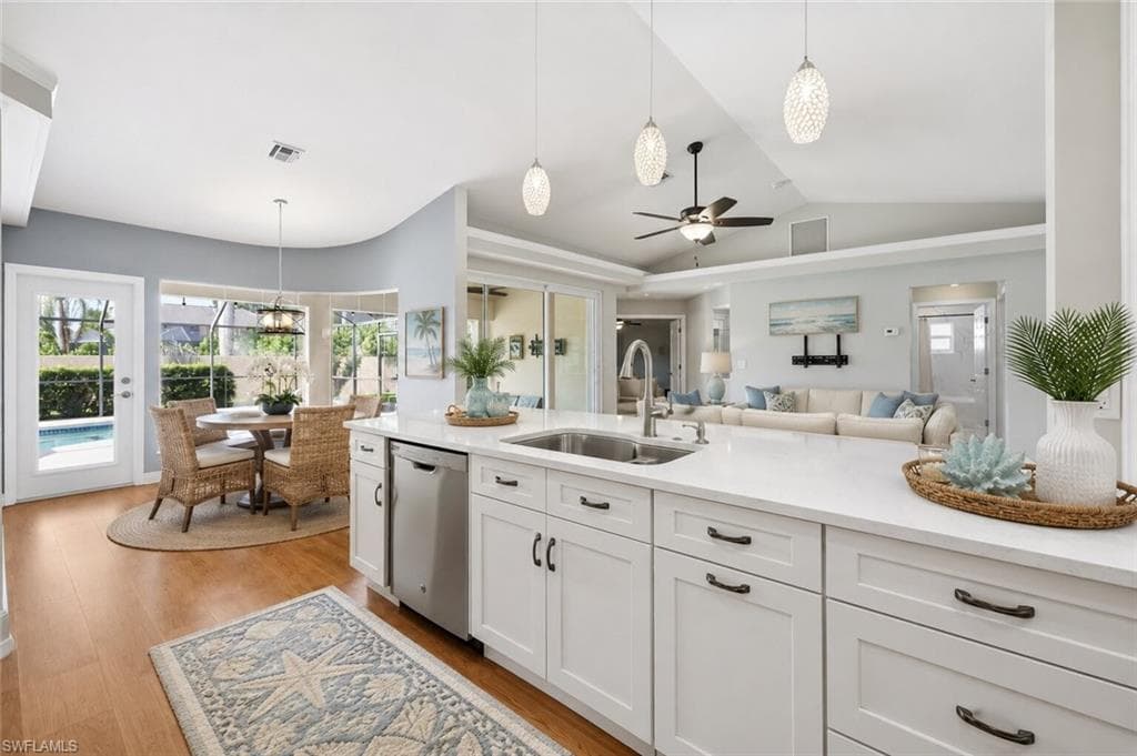 Updated kitchen with Quartz countertops and stainless appliances, decor and furniture is AI generated, kitchen is full updated as seen