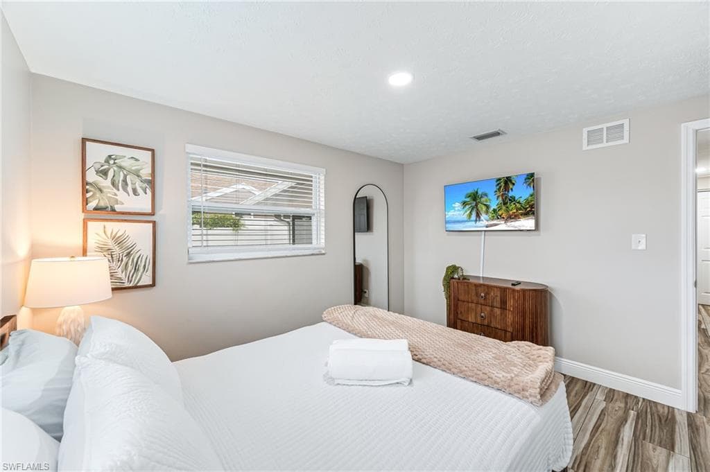 Bedroom featuring hardwood / wood-style floors