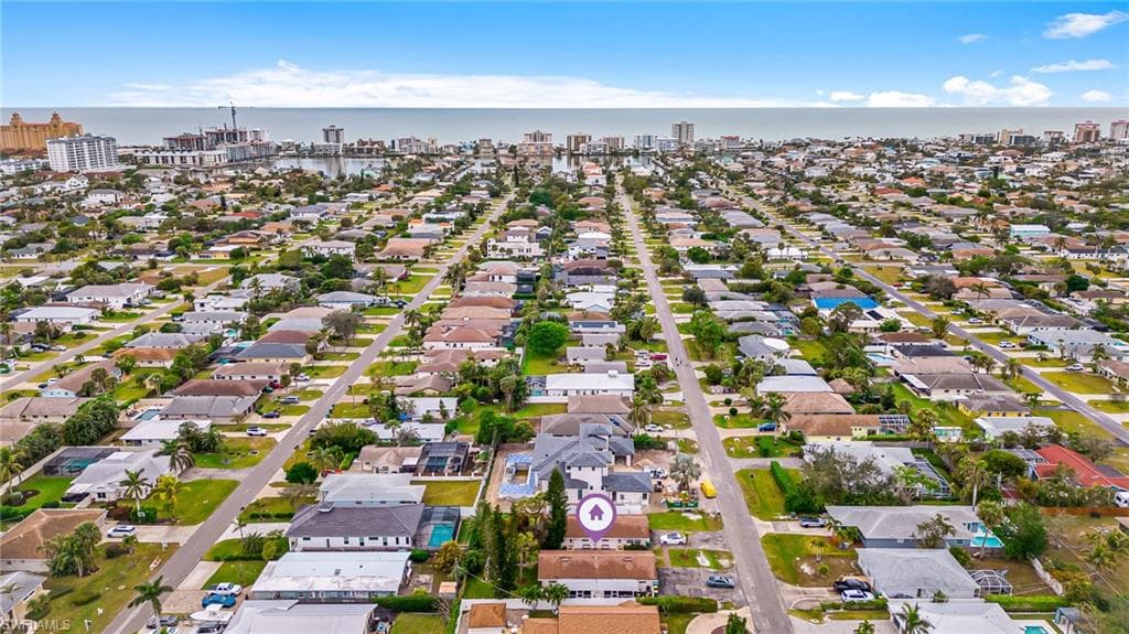 Aerial view showing the Gulf and Vanderbilt Beach a few blocks away