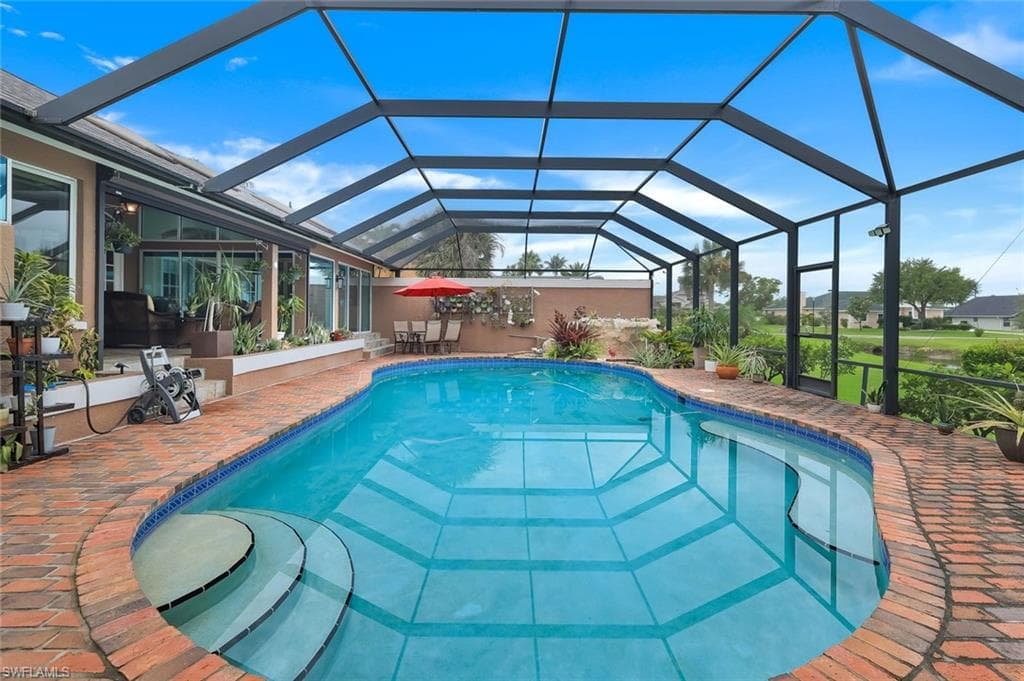 Partial View of the Pool Area- Picture Window Cage- Pool is 39'x18'