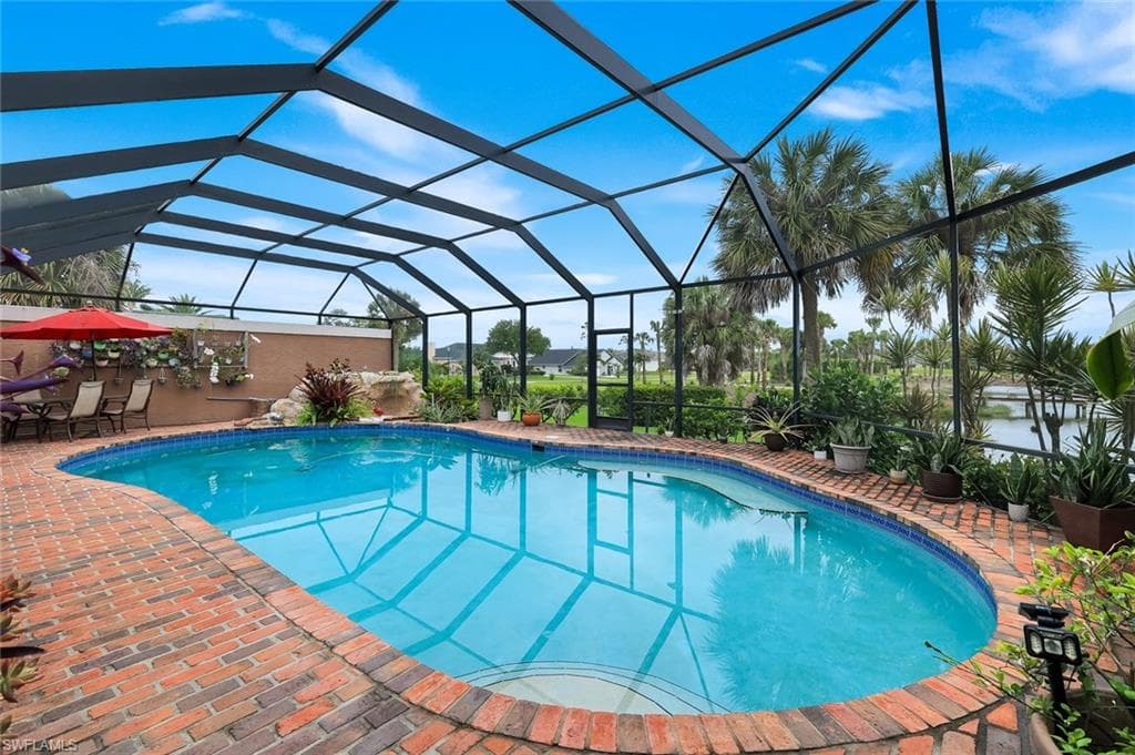 True Brick Tile, Privacy Wall, Screened Pool Cage, The Pool Deck is 50'x30'- This is a Partial View