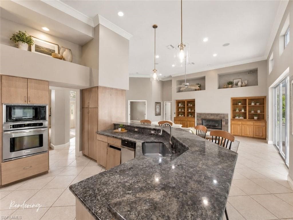 One possible renovation concept for the kitchen, showcasing how thoughtful design updates can elevate this expansive space into a true entertaining showpiece.