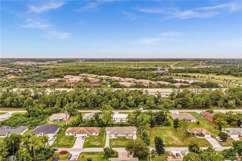 Aerial perspective showcasing a residential area with varied housing styles
