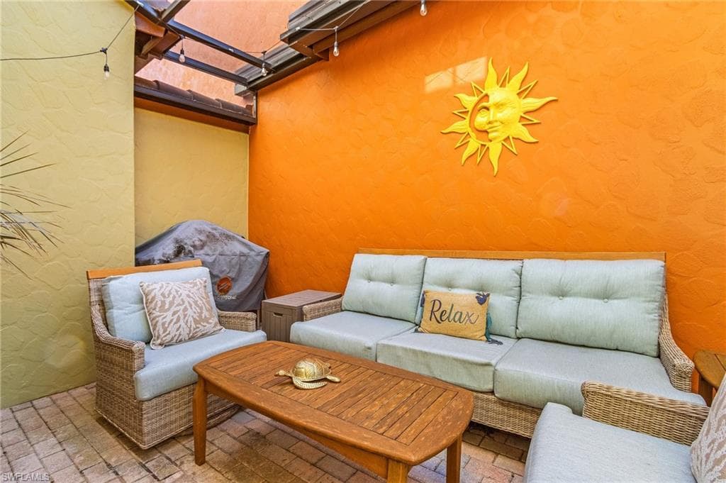 View of patio with an outdoor living space