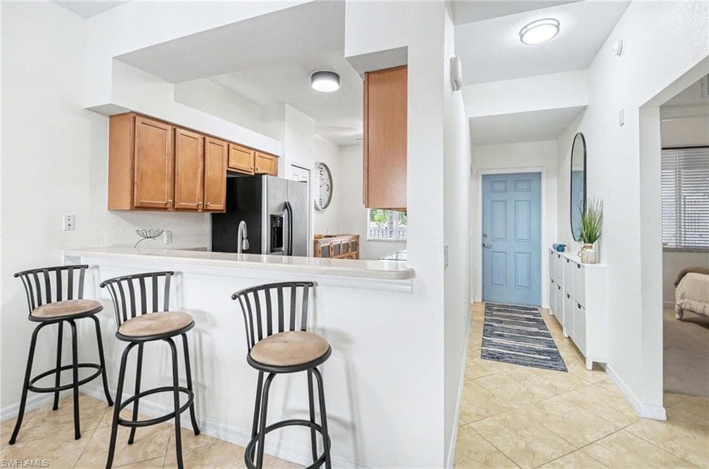 Breakfast Bar between kitchen and living room.