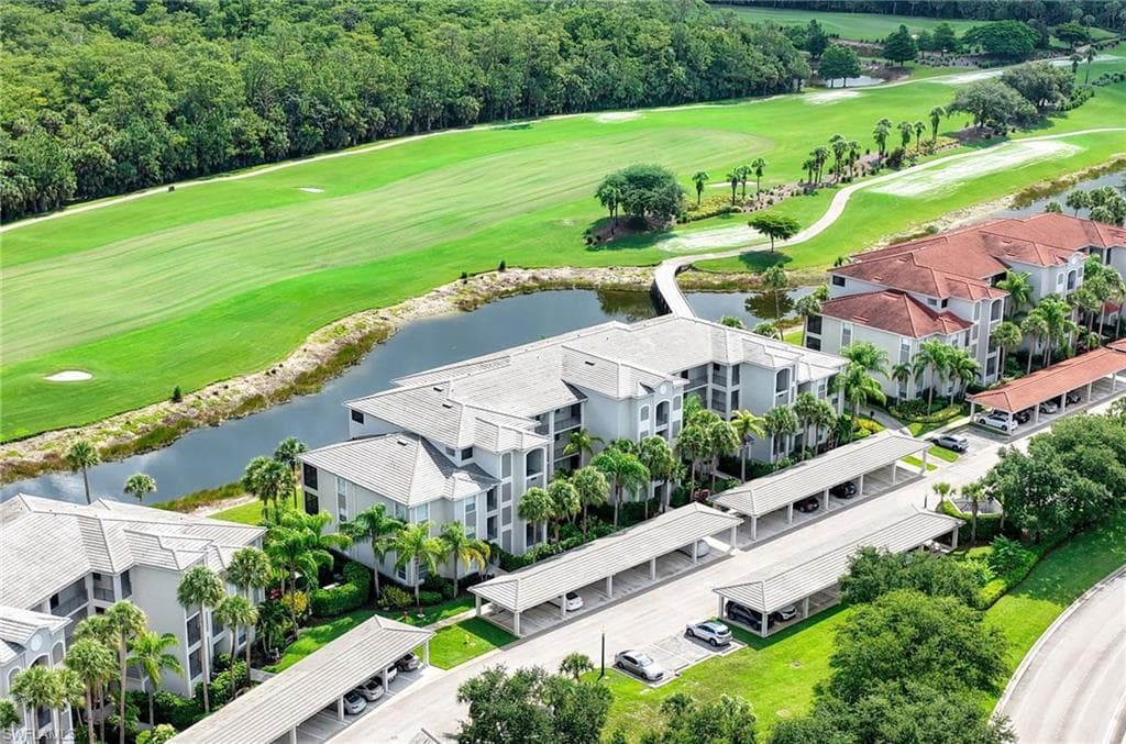 Bird's eye view, assigned carport and guest parking.