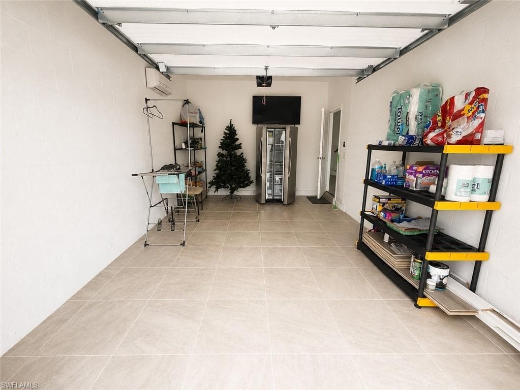 Bonus Extra Garage with Tiled Floor and AC