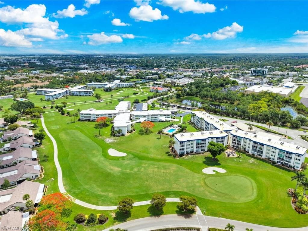 Aerial perspective showcasing expansive green golf course grounds