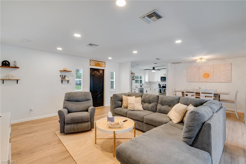 Seamless flow between living, dining, and kitchen
