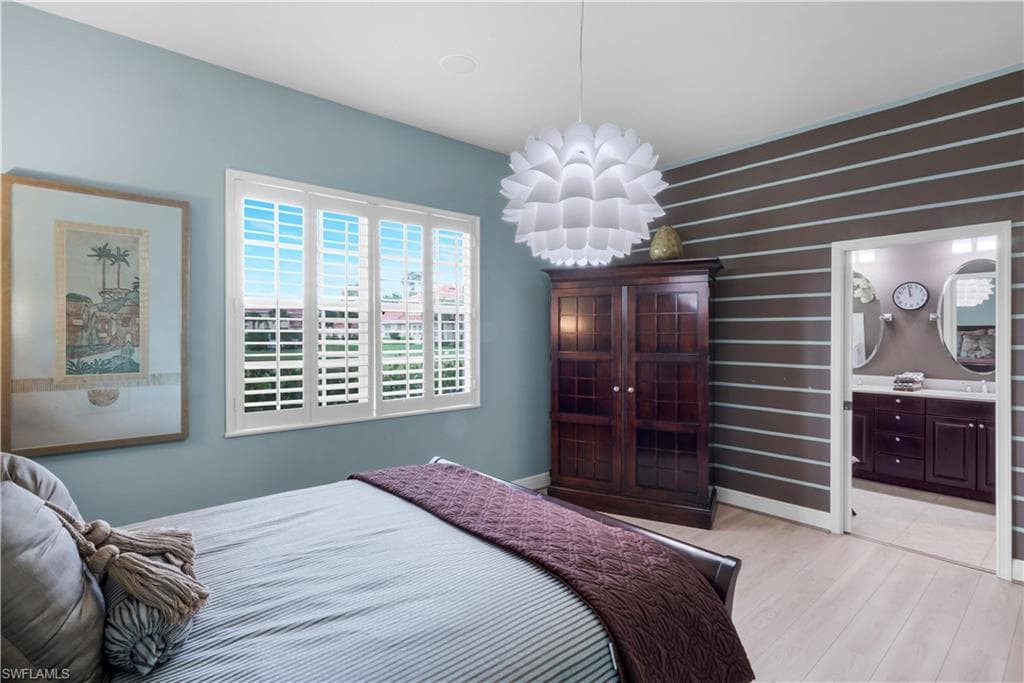 THIS IS A LOVELY RETREAT W/ENOUGH SPACE FOR SITTING AREA-LOOKING INTO THE MBATH