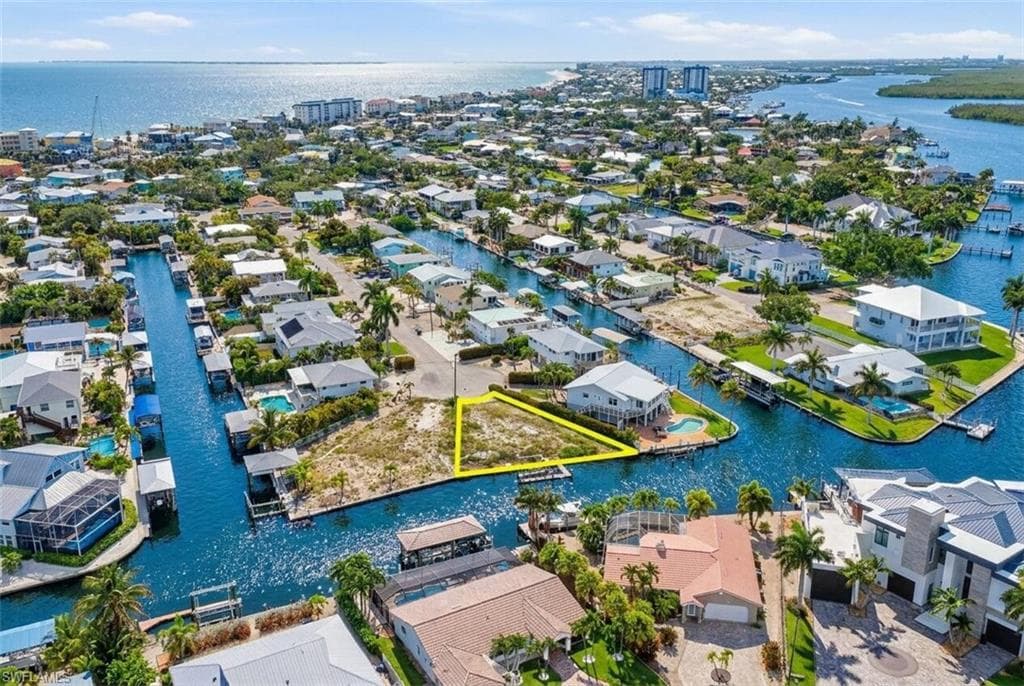 Vacant waterfront parcel with direct canal access - Virtually Edited Image