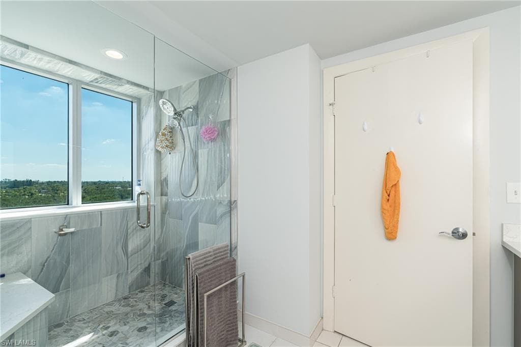 master bathroom with custom shower, extra storage and double sinks