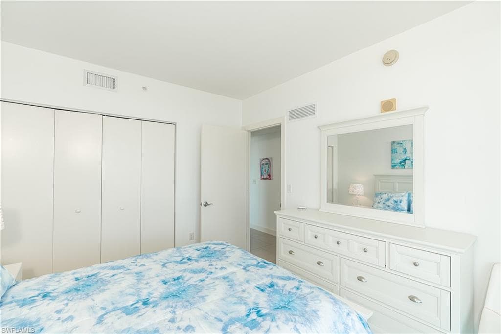 guest bedroom with private balcony