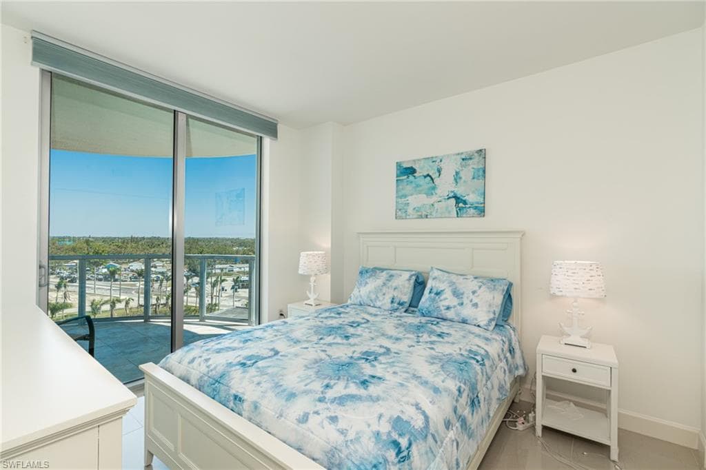 guest bedroom with private balcony