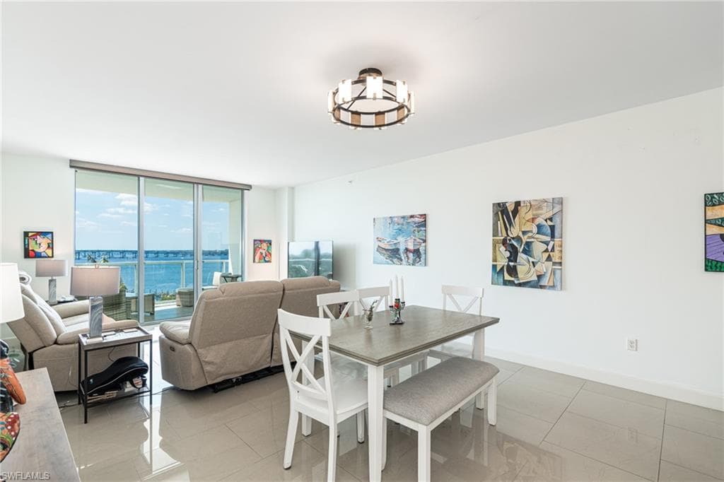 living room and dining area with river views