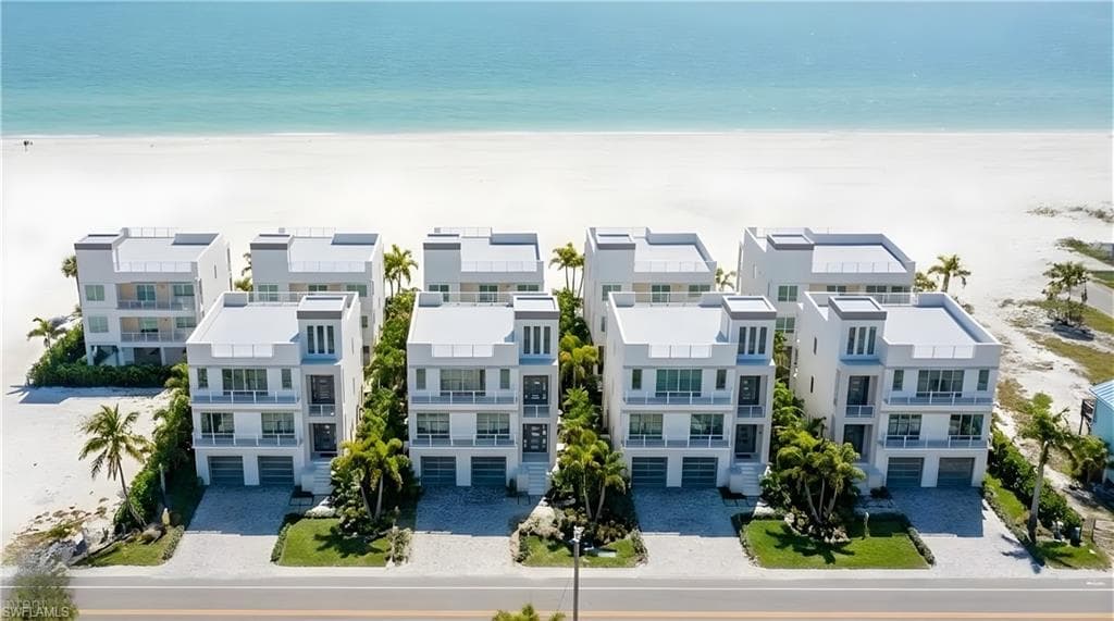 Virtual concept image – example of potential site development with elevated Gulf-front homes and pools.