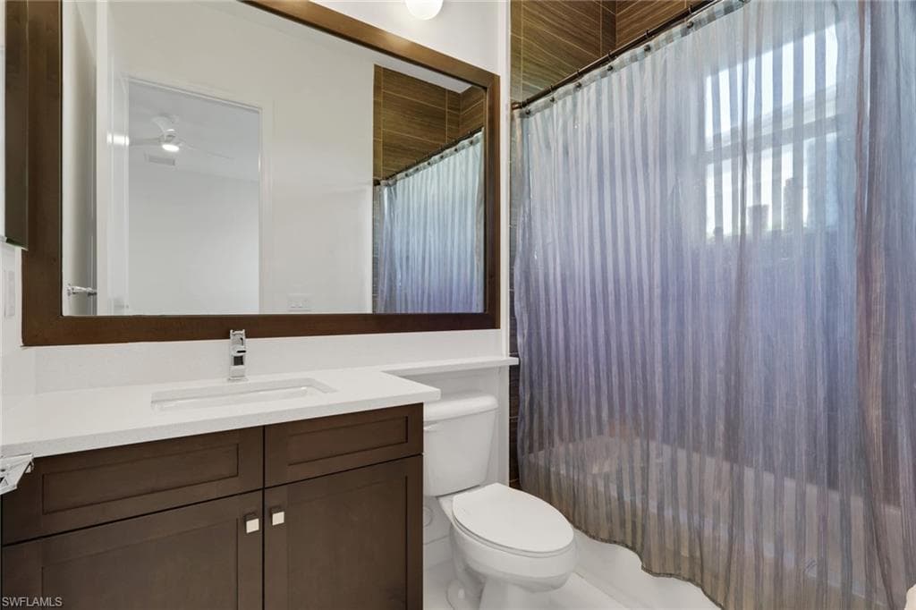 Full bath that connects to one of the bedrooms on the first floor.