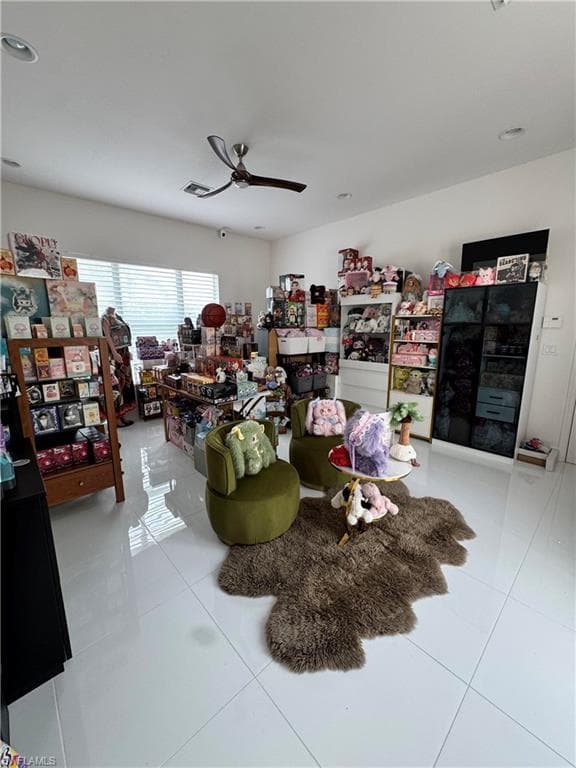 "Club Room" or large rec room, bonus room with its own private entrance at the front of the home with access to the garage.