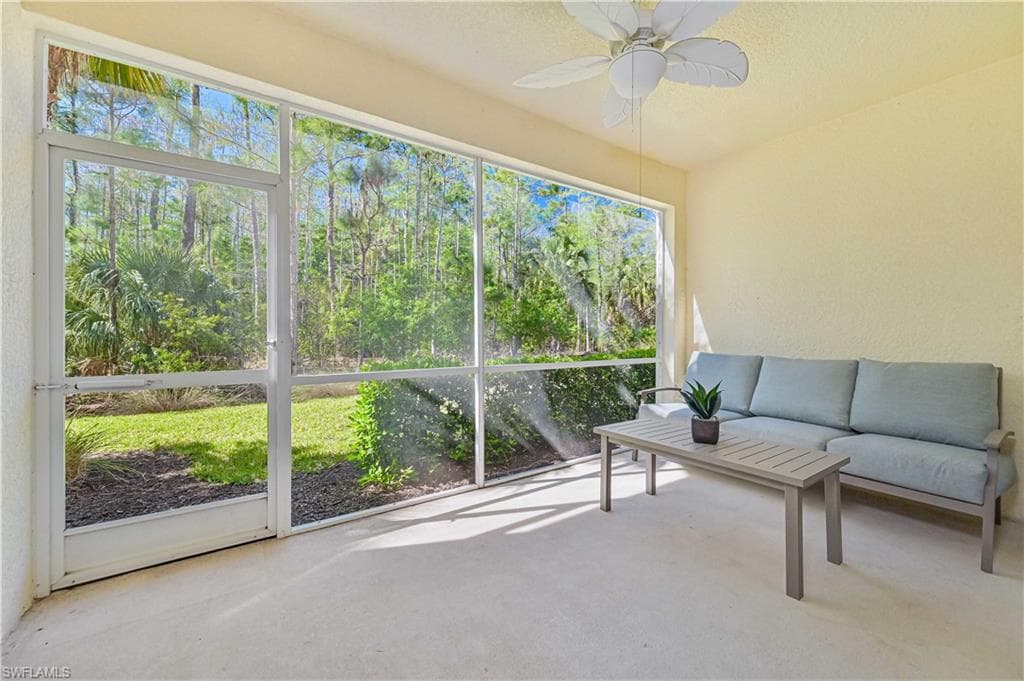 Relax and unwind on the screened lanai while enjoying serene nature views and the privacy of a 31-acre preserve backdrop.