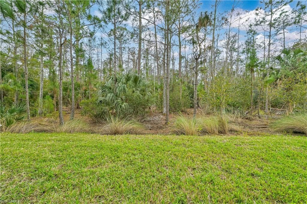 Peaceful views of the lush preserve, creating the perfect setting for morning coffee or evening relaxation.