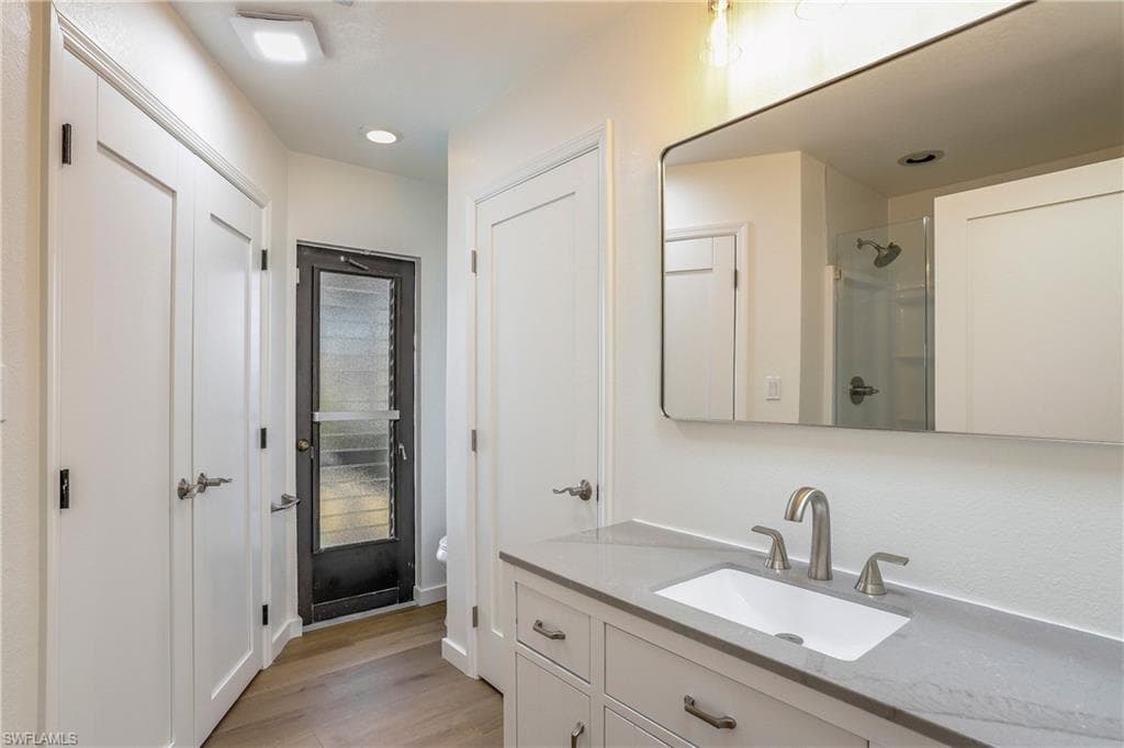 Master bathroom with two closets