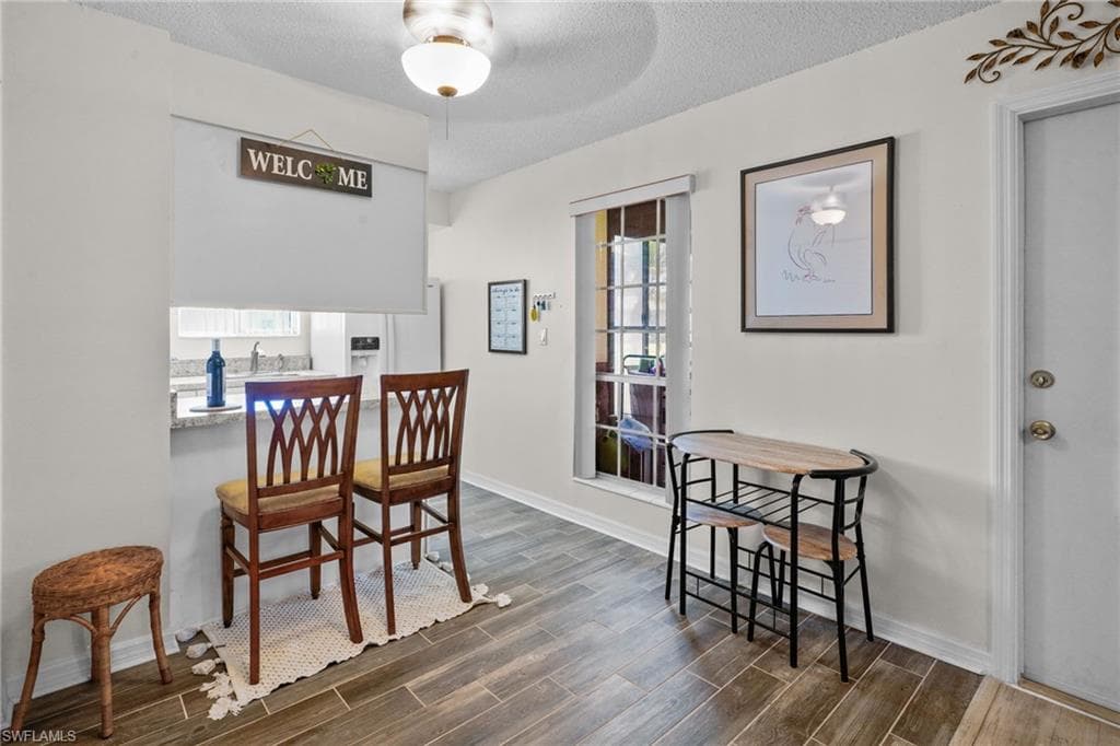 Upgraded/updated tile flooring. Breakfast bar. Kitchen/Dining area large window for lots of natural light.