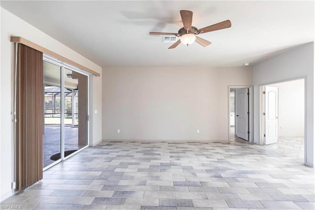 Featuring Imported Ceramic Italian tiles, ceiling fan and custom fabric verticals!