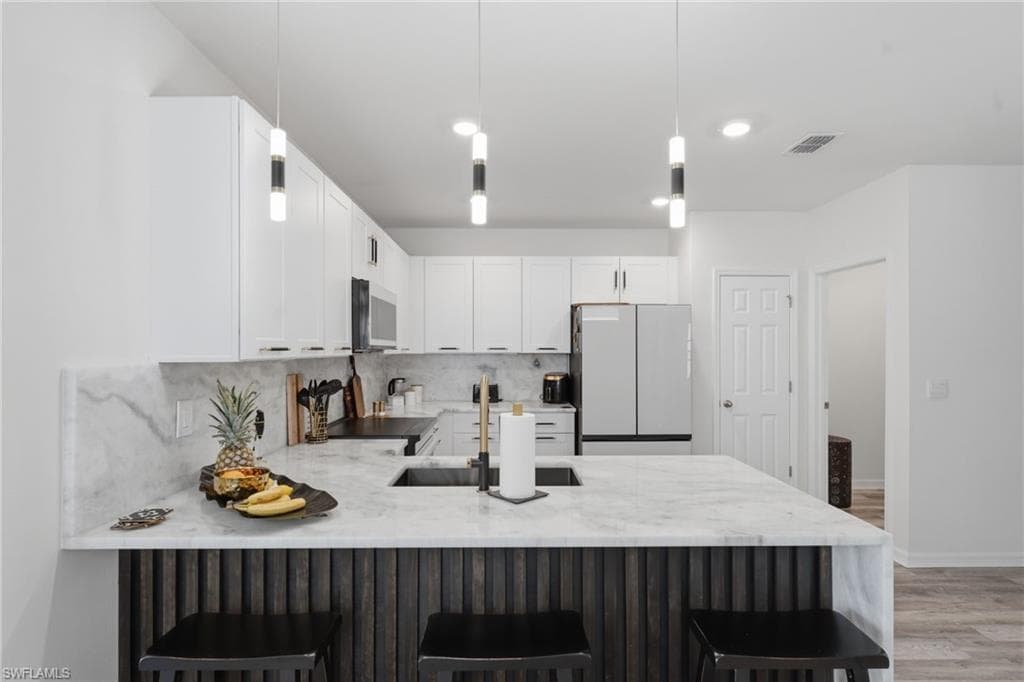 High end finishes in the post builder upgraded kitchen.