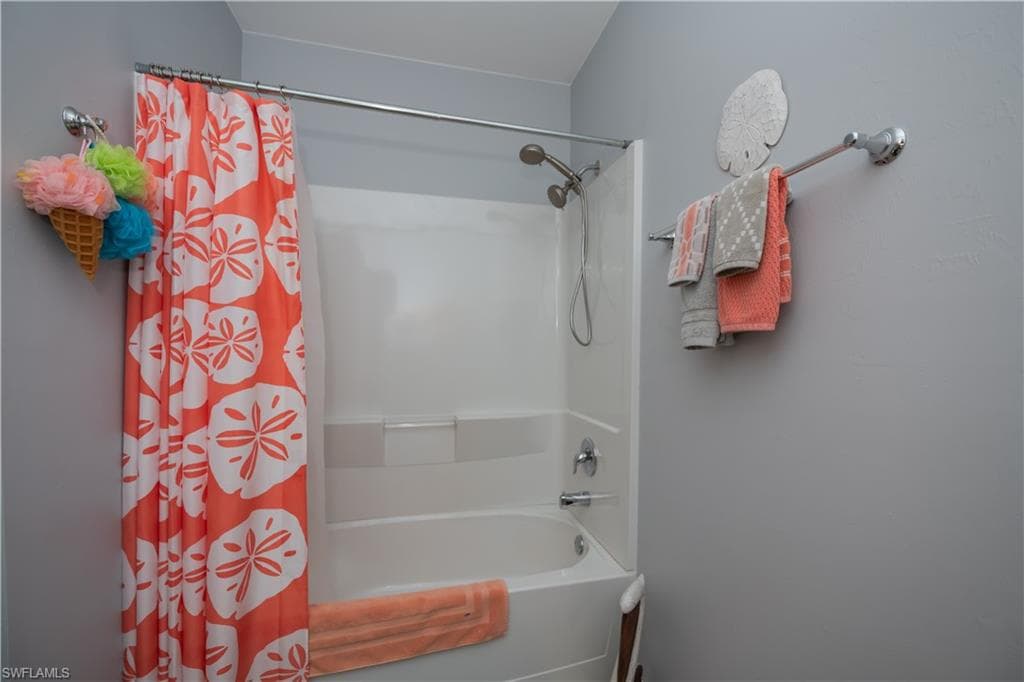 Bathroom featuring shower / tub combo