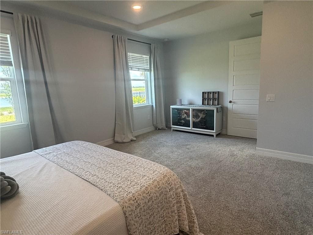 Master Bedroom with large area for dressers and sitting area.