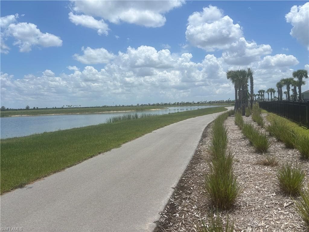 Walking path right off backyard along Lake