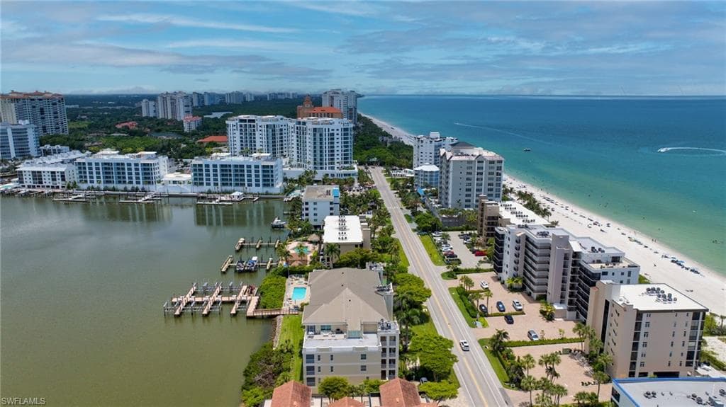 Coastal residences featuring waterfront access and a short distance to the sandy beach